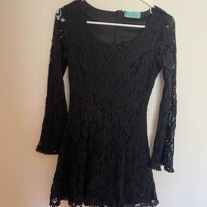 Long sleeved, black lace mini dress. Perfect for Fall/Winter occasions!